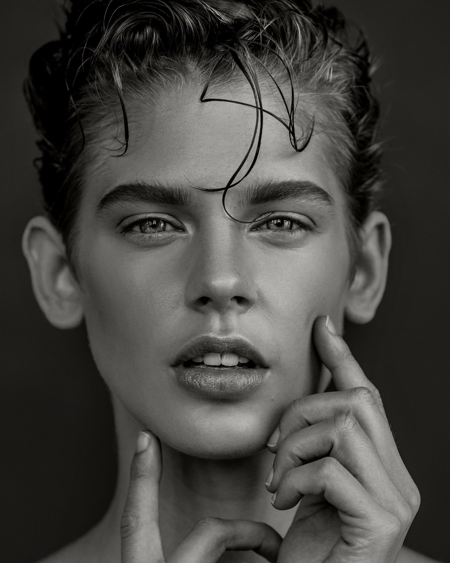 Hair editorial in black-and-white, androgynous look with wet-look hair