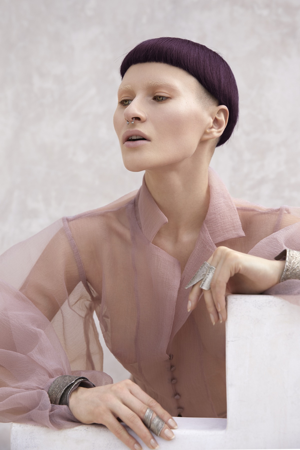Hair editorial, purple bowl-cut, sharply cut hair