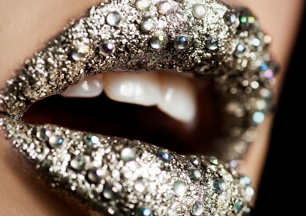 Beauty macro, lips encrusted with crystals and glitter