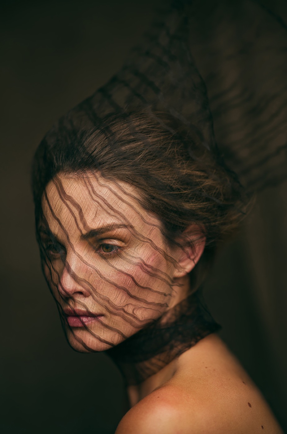 Editorial hair and make-up in black and white, tulle shadow lines across the face, photography Rahi Rezvani