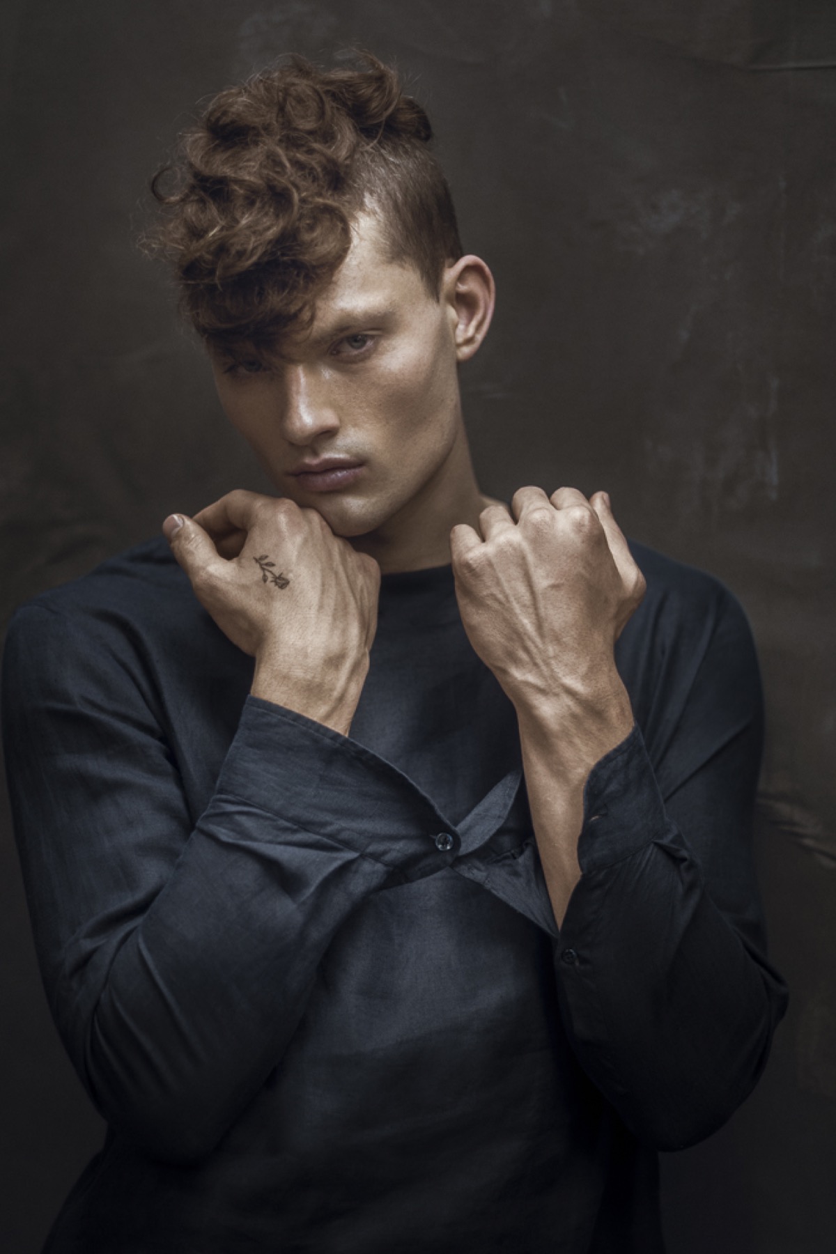 Editorial hair and make-up in black and white, model with red curls, Armani, photography Rahi Rezvani